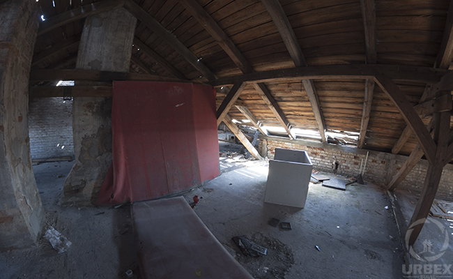 an attic in an abandoned building
