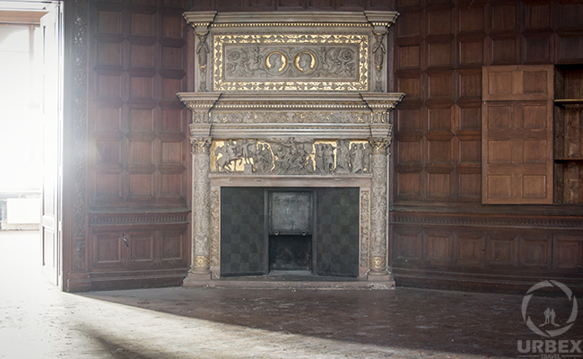 golden fireplace in an abandoned palace