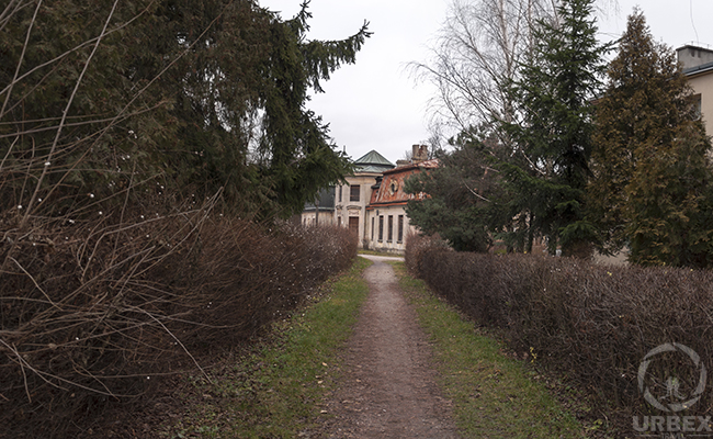 long way in a park with an abandoned mansion