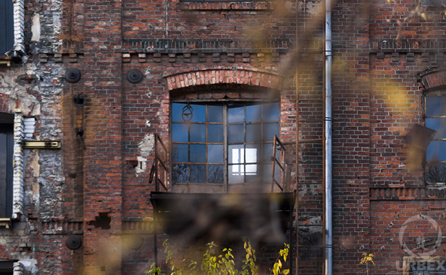 brocken window in abandoned pollena factory in poland